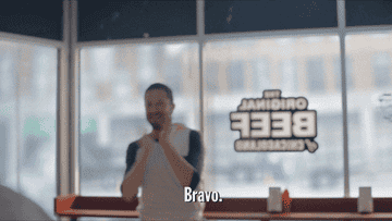 gif of character from the bear clapping and saying bravo