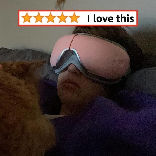 reviewer with the renpho eye massager on and a 5 star rating saying &quot;I love this&quot;