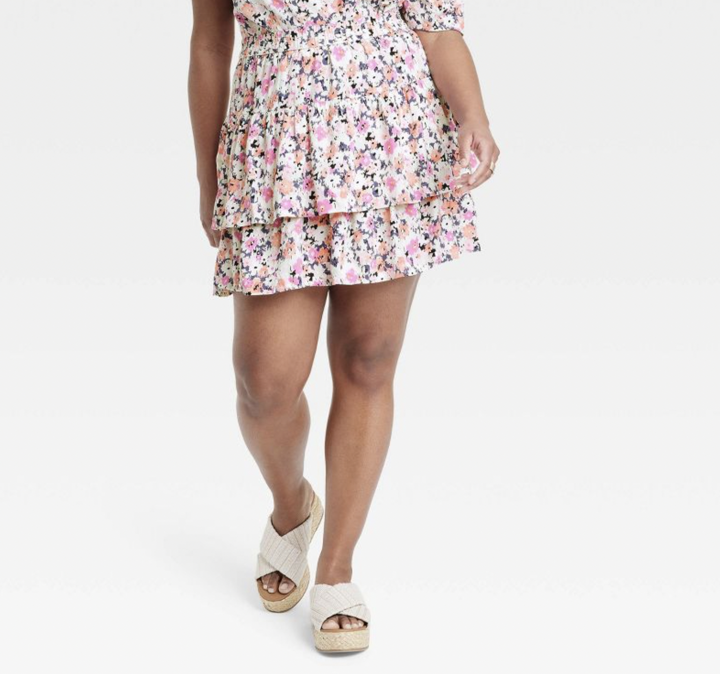 model wearing the floral dress