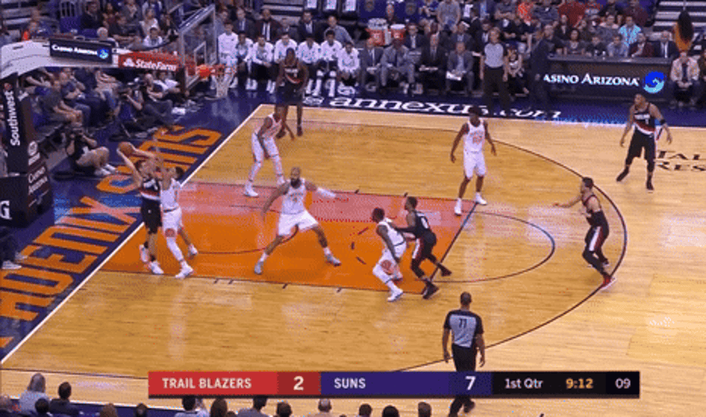 five basketball players turn and run at the exact same time