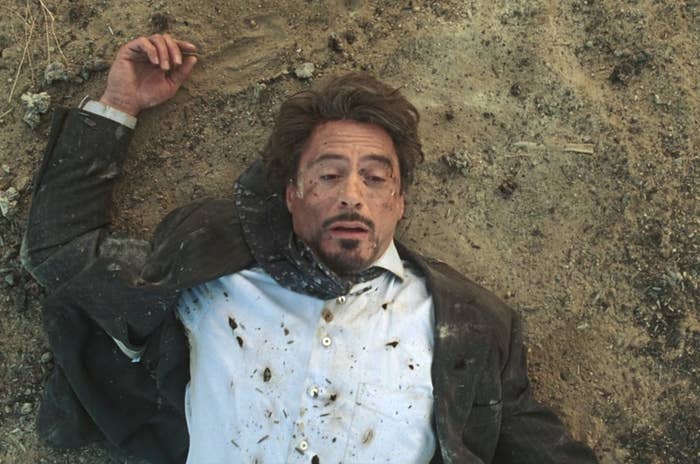 Tony Stark laying in the dirt