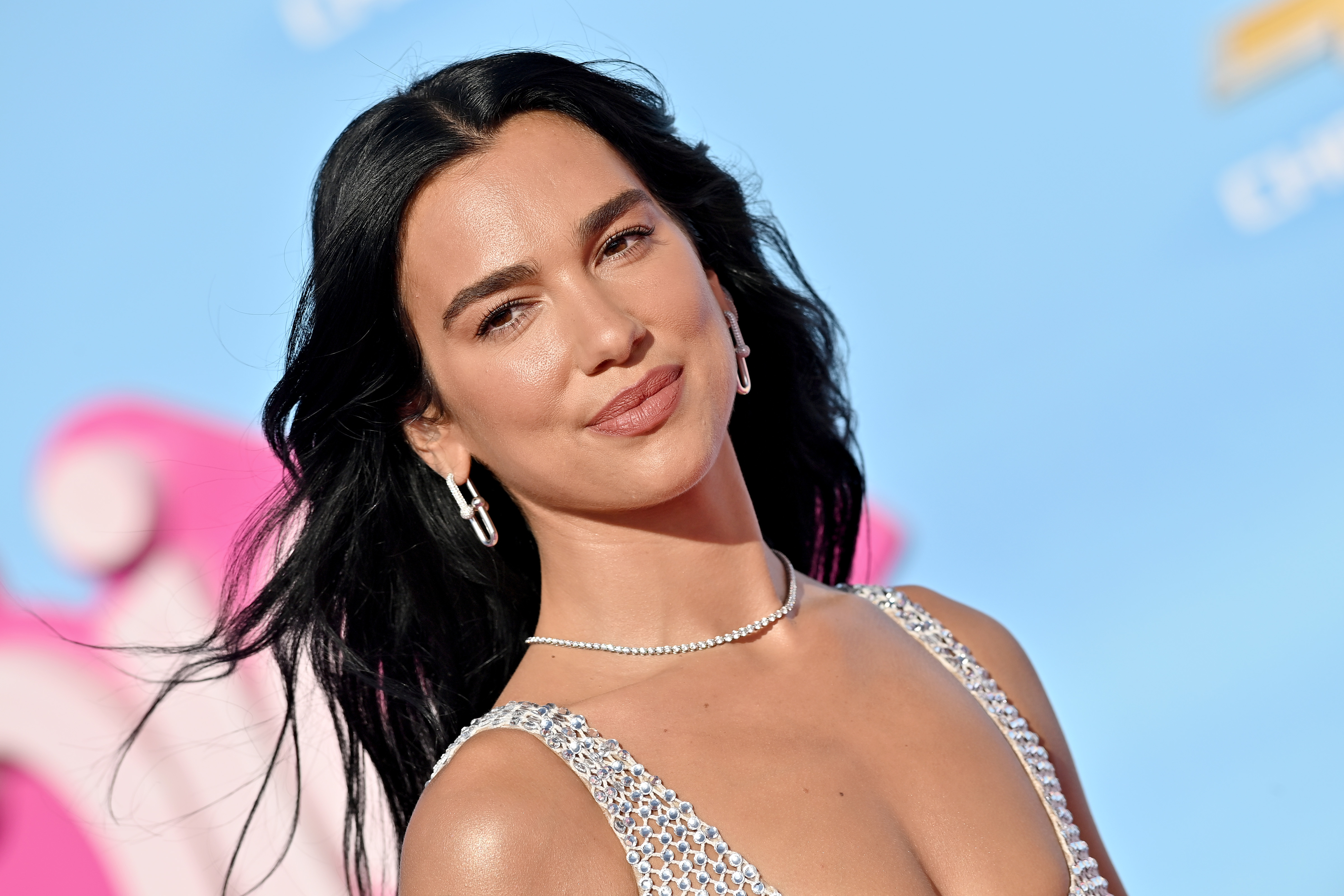 Dua Lipa's Sheer Dress Was Almost Hidden Under a Massive Fur Coat