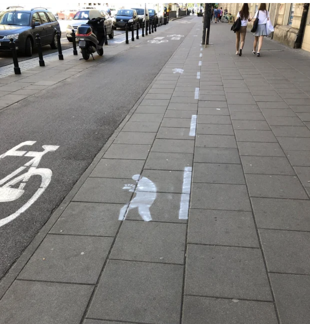 a walkway for people with phones