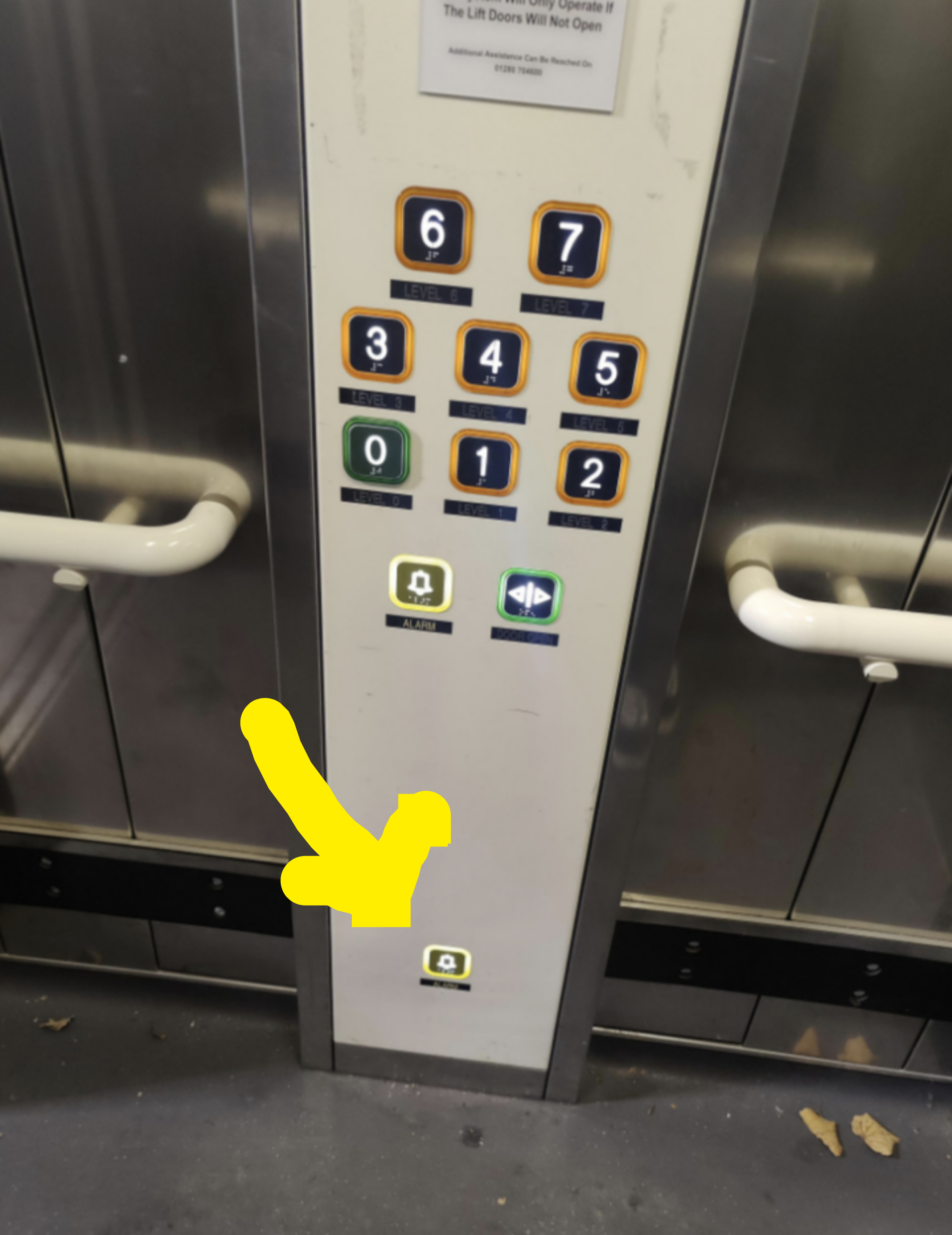 There&#x27;s one emergency button next to the floor numbers, but a second emergency button located at the very bottom, so it can be pressed from the floor