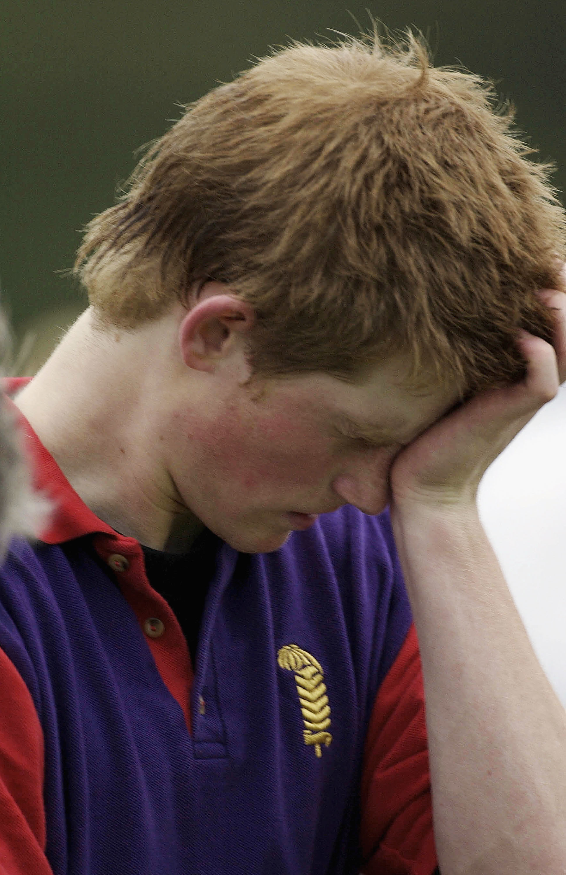 Prince Harry looks tired during a polo match on June 18, 2003 in Windsor, England