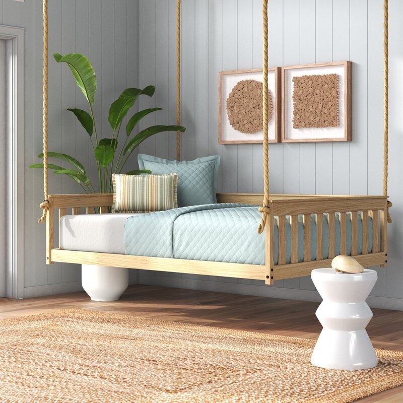 Image of the wooden hanging daybed
