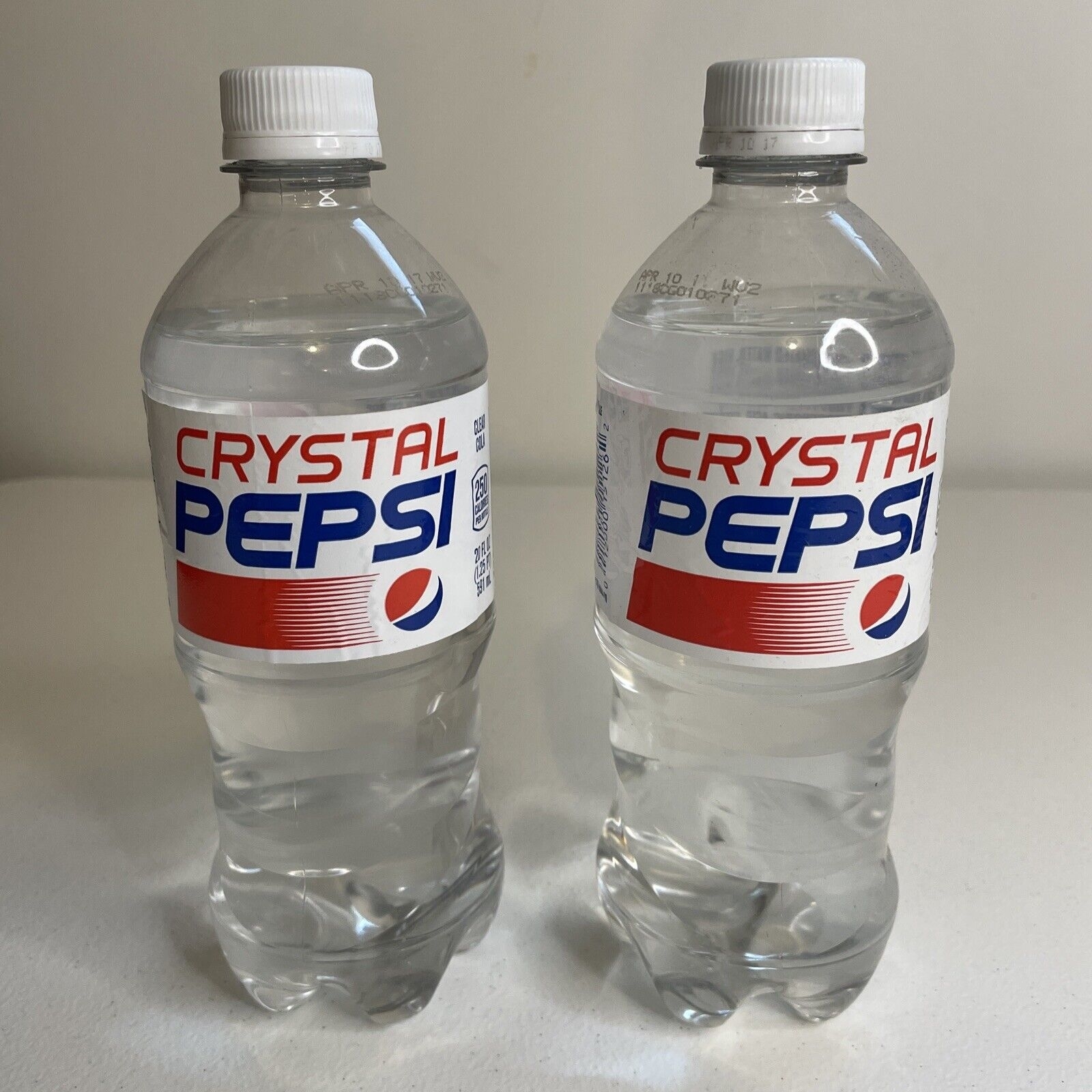 Clear bottles of Crystal Pepsi