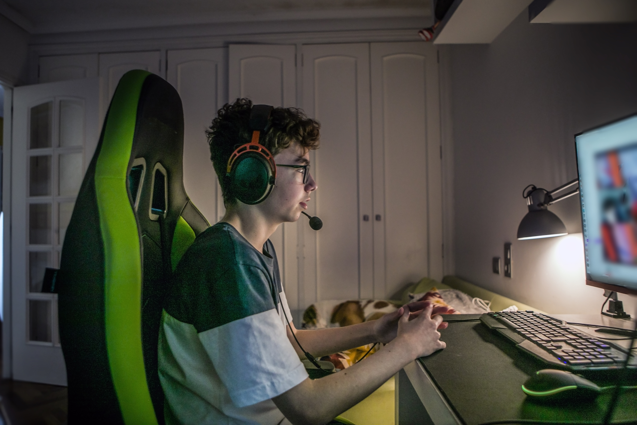 teen playing computer games