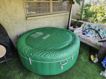 the hot tub with its cover attached