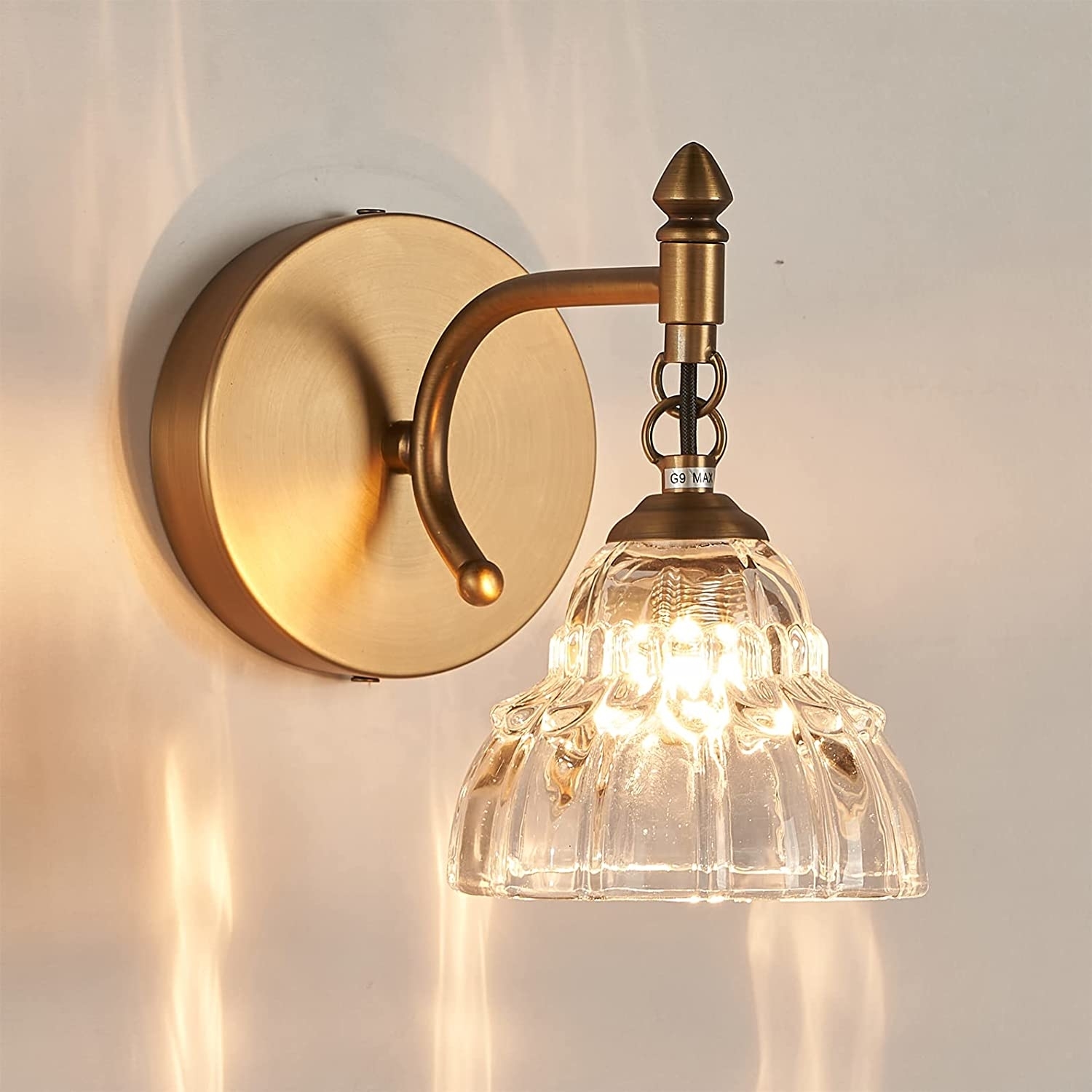 glass sconce with brass detail