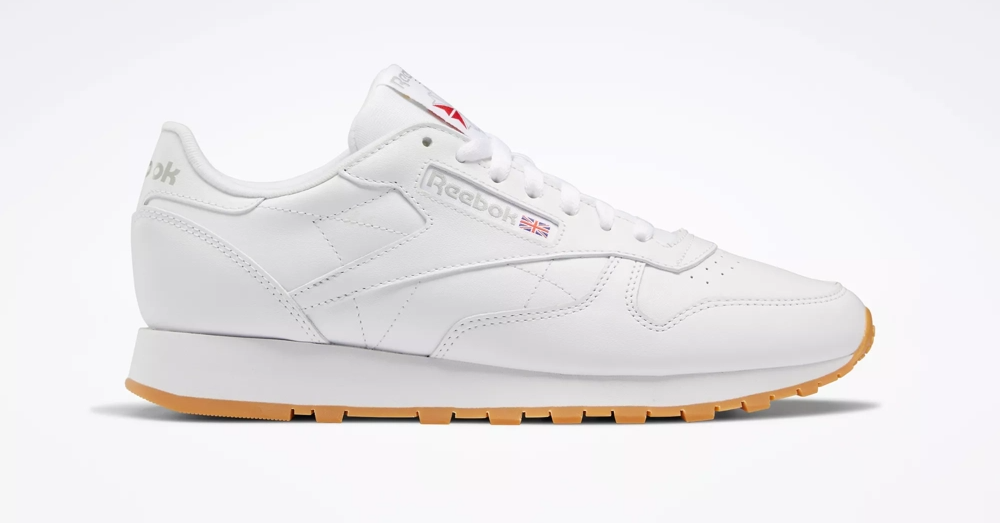 Reebok All-leather white sneakers with a gum sole.