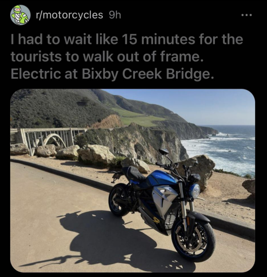 photo of the person&#x27;s motorbike by the beach