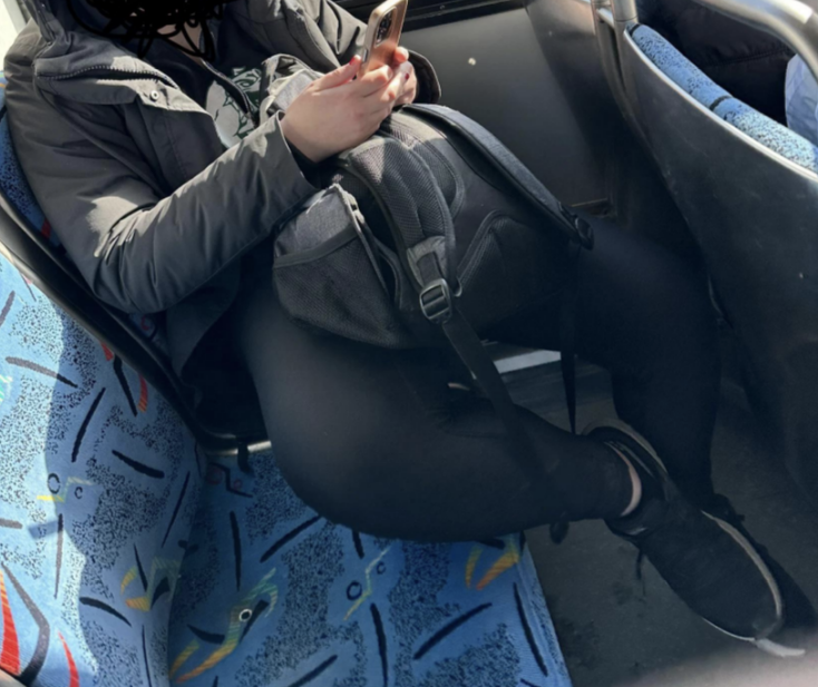 woman blocking the seat