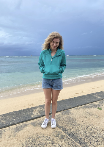 buzzfeeder in aqua green half zip cropped sweatshirt with hood