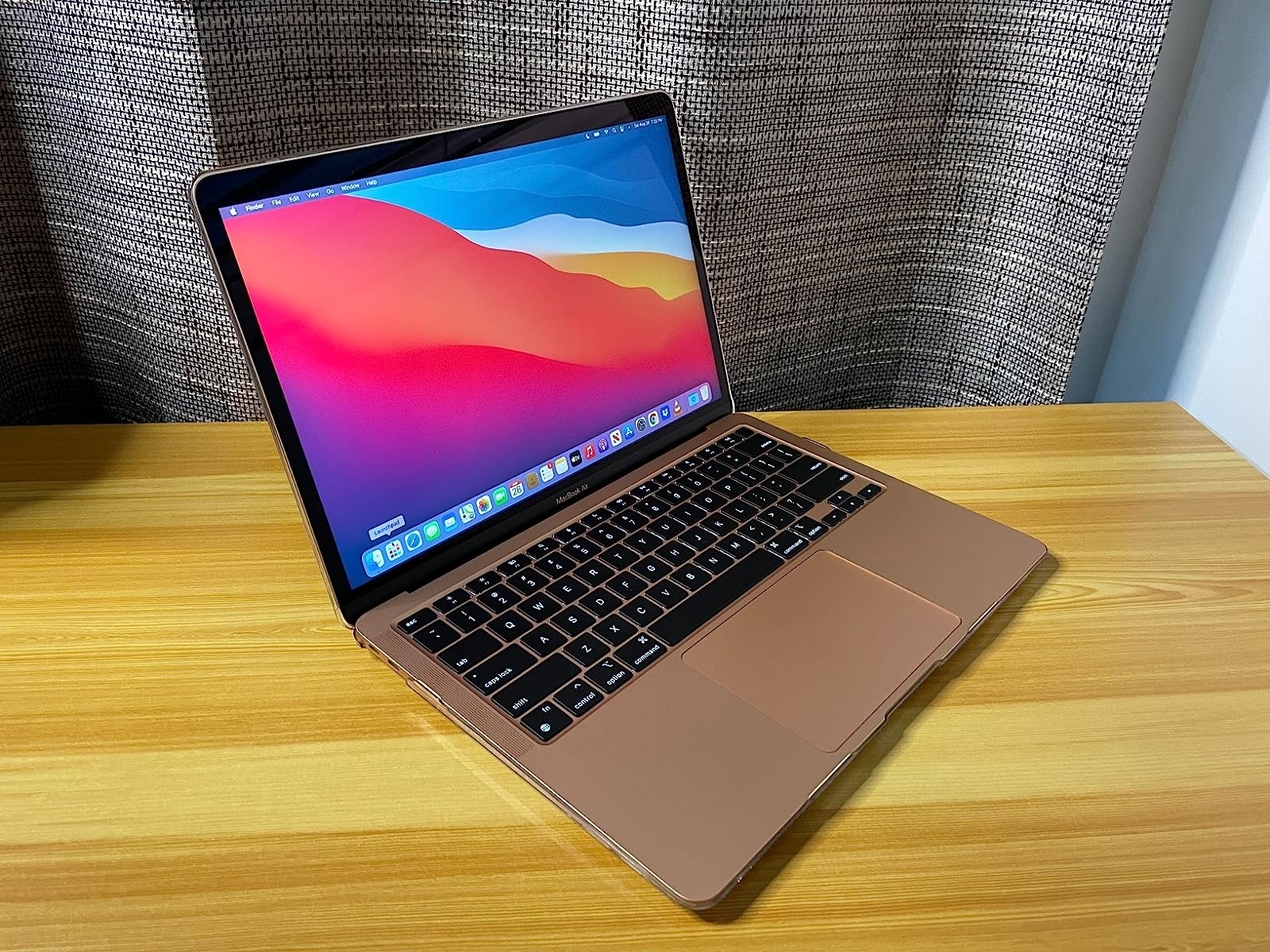 reviewer photo of their gold-colored laptop
