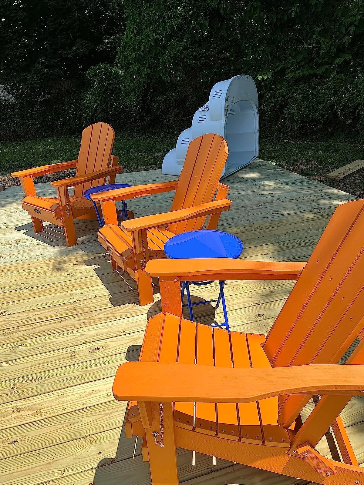 reviewer photo of three bright orange chairs