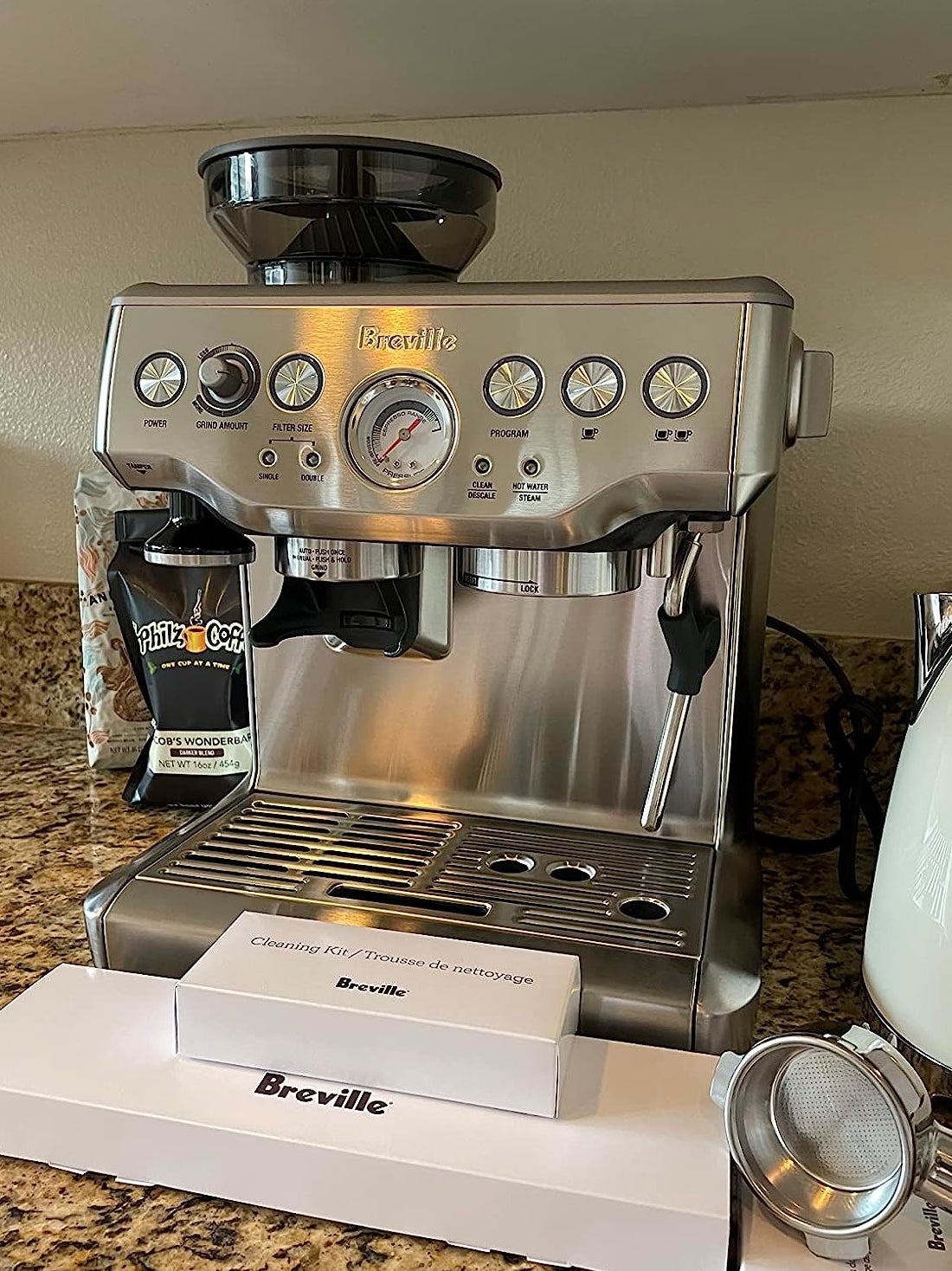 a reviewer photo of the espresso machine on a countertop
