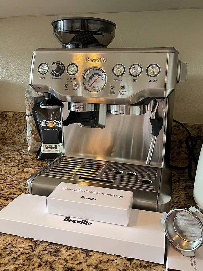 a reviewer photo of the espresso machine on a countertop