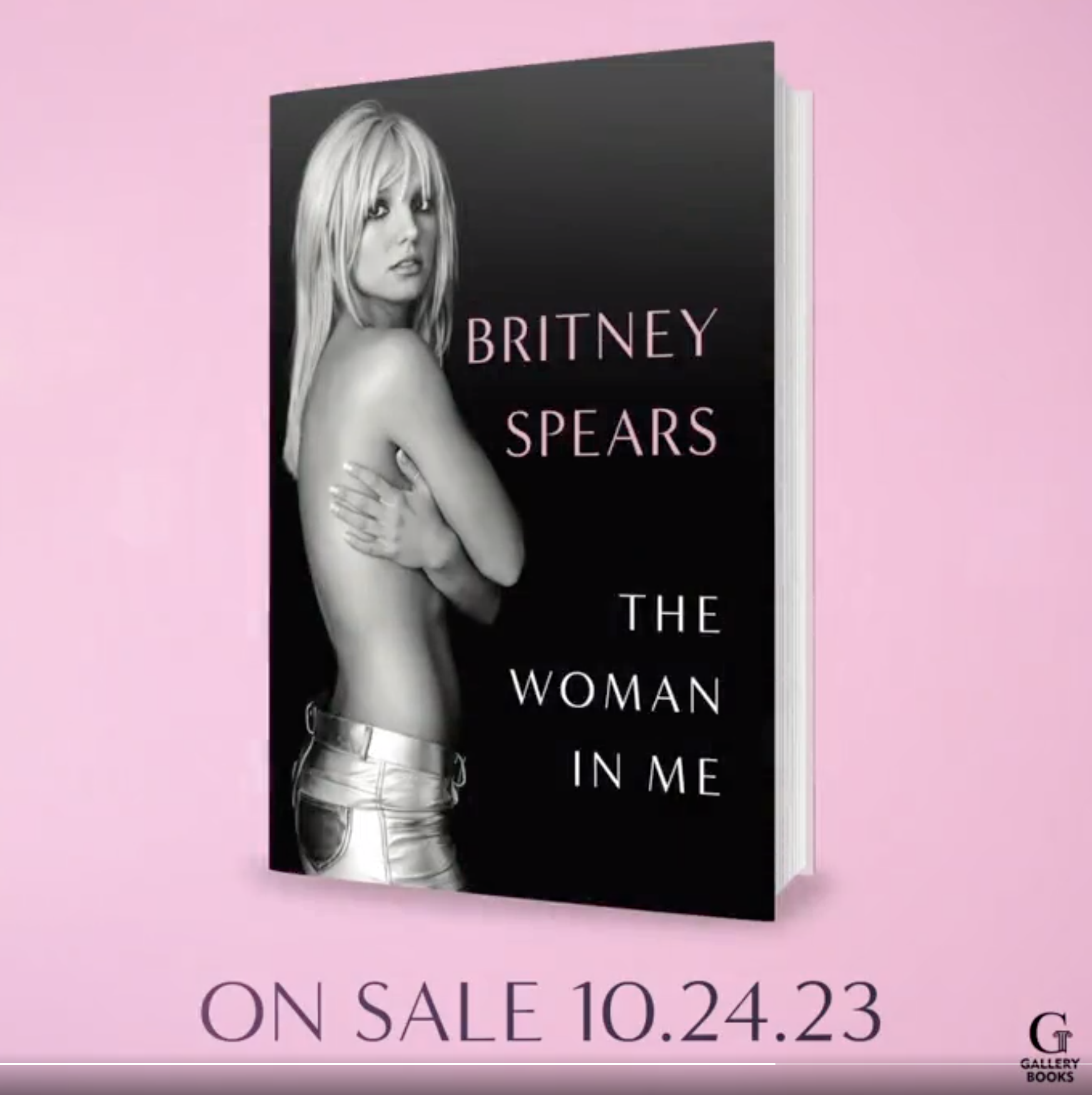 An old photo of a shirtless britney covering herself with her arms on the book cover