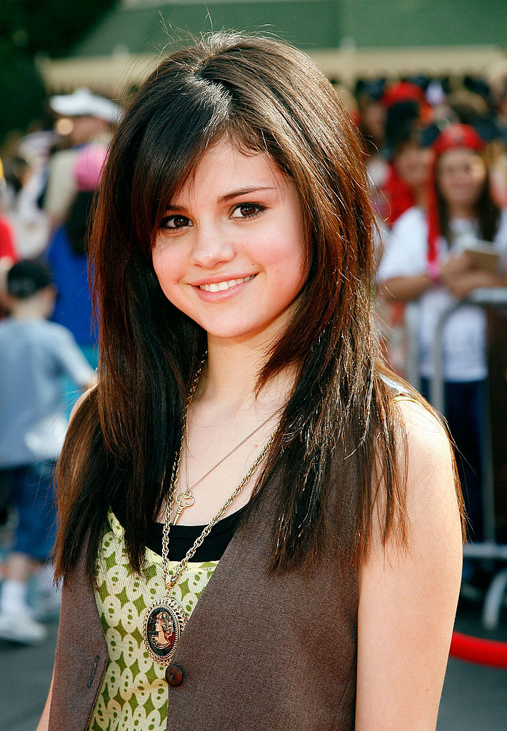 A closeup of a pre-teen Selena Gomez at a media event