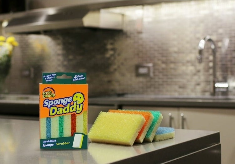 the Scrub Daddy sponges on a kitchen counter
