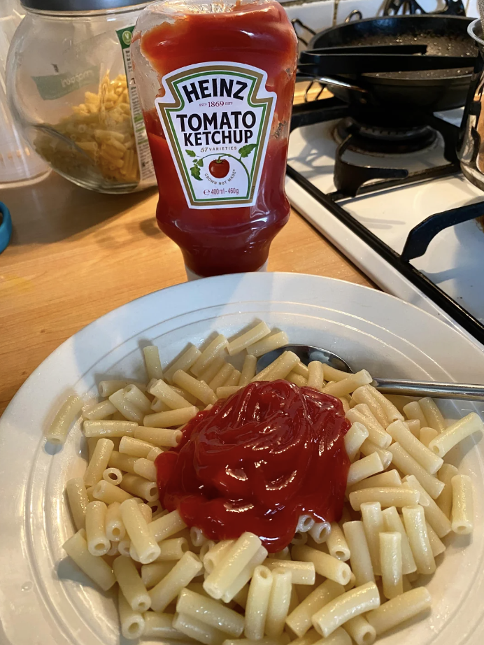 Pasta covered in ketchup