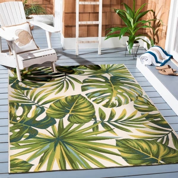 the outdoor rug with palm tree leaves