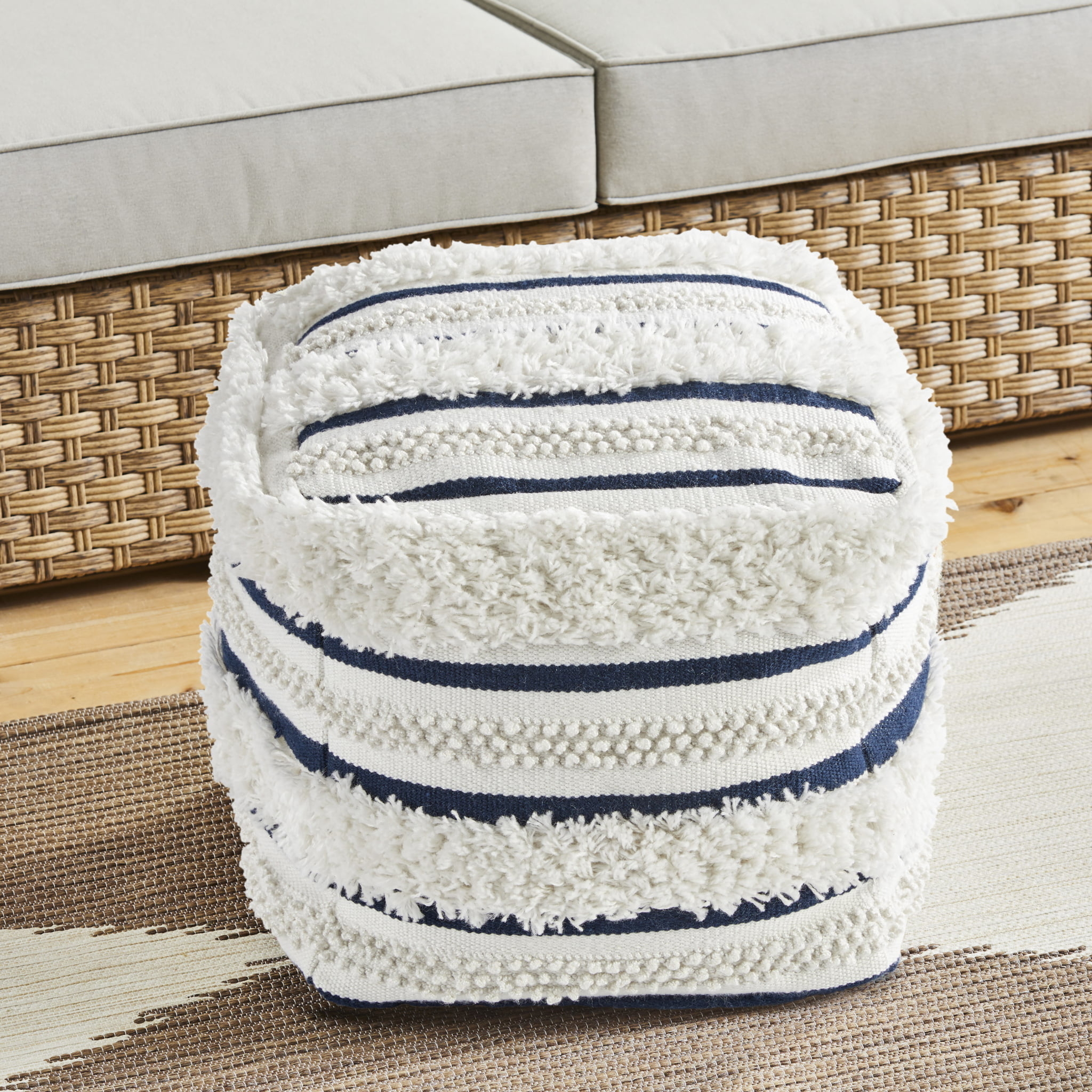the navy and cream pouf