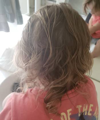same child's hair, no longer with bed head
