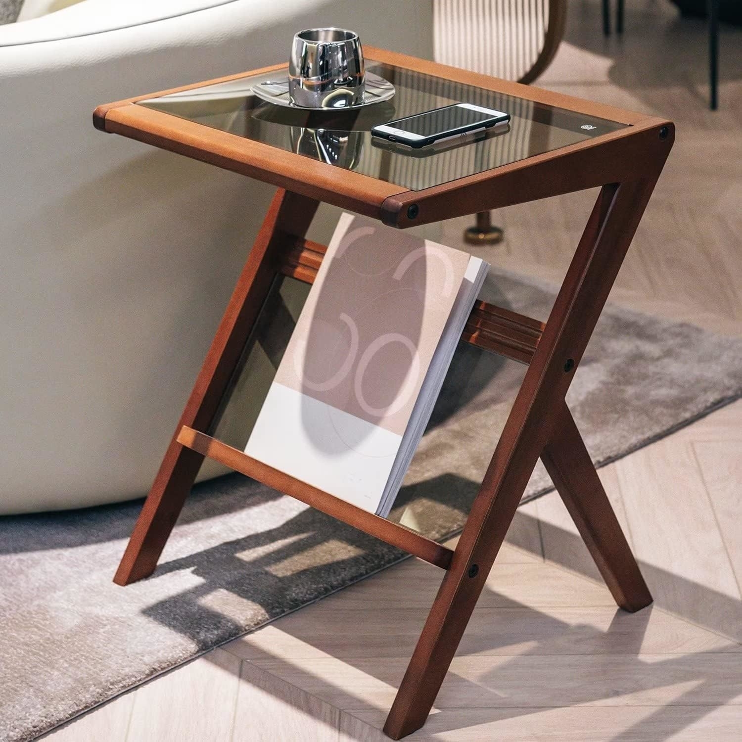 foldable side table with rest for a book and glass top