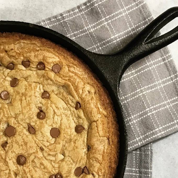 Reviewer image of a chocolate chip cookie cooked in the skillet