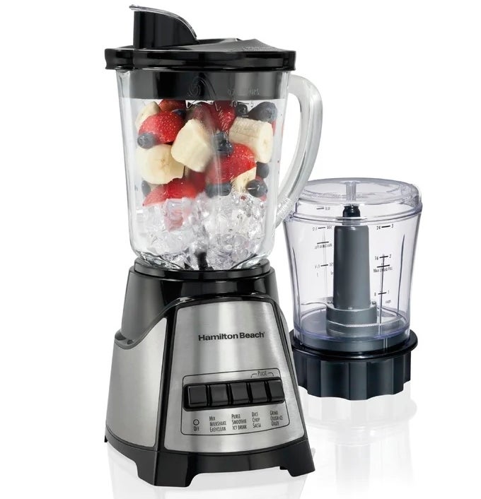 Blender with fruit and ice inside