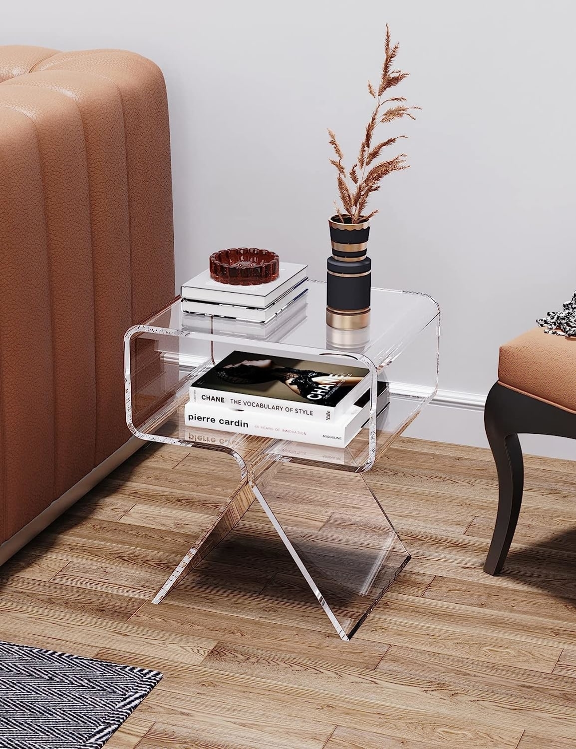 acrylic night stand with room for books in living room