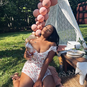 BuzzFeed writer Jordan Grigsby posing wearing Lancome foundation