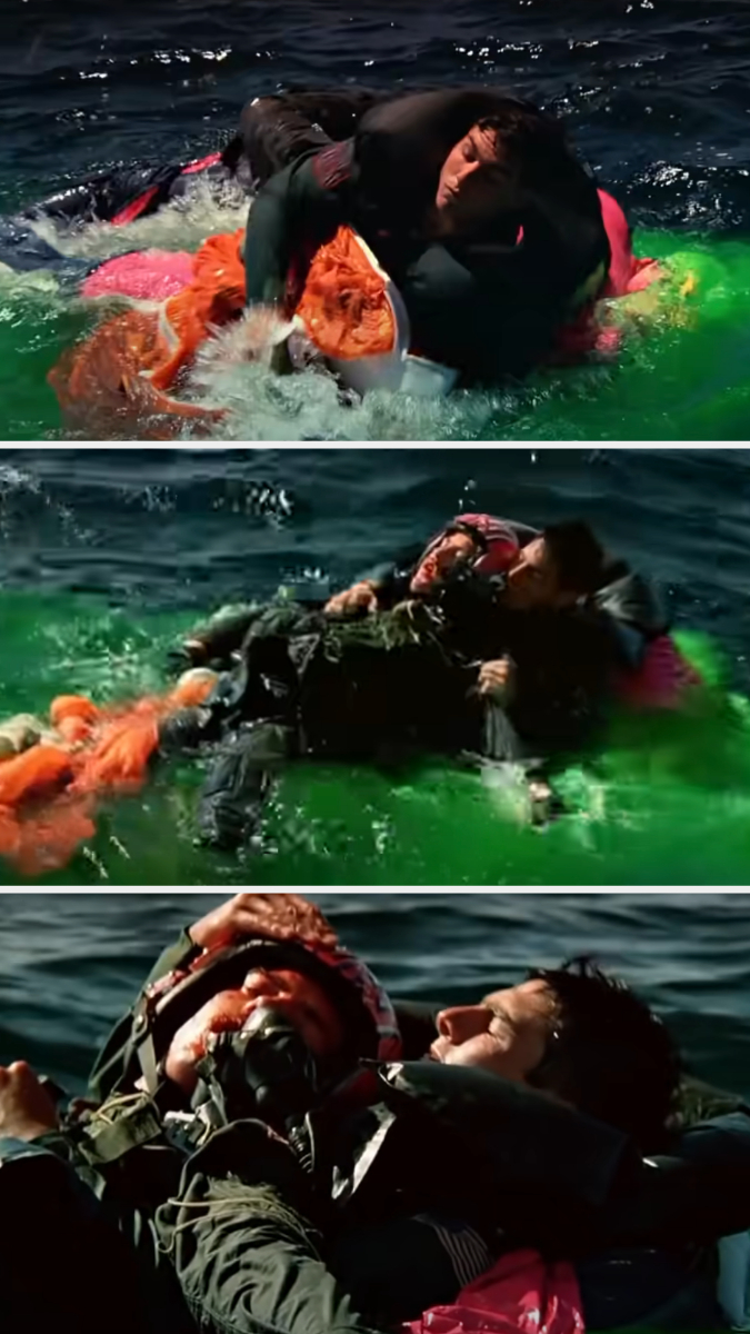 tom in the water with a parachute holding his costar