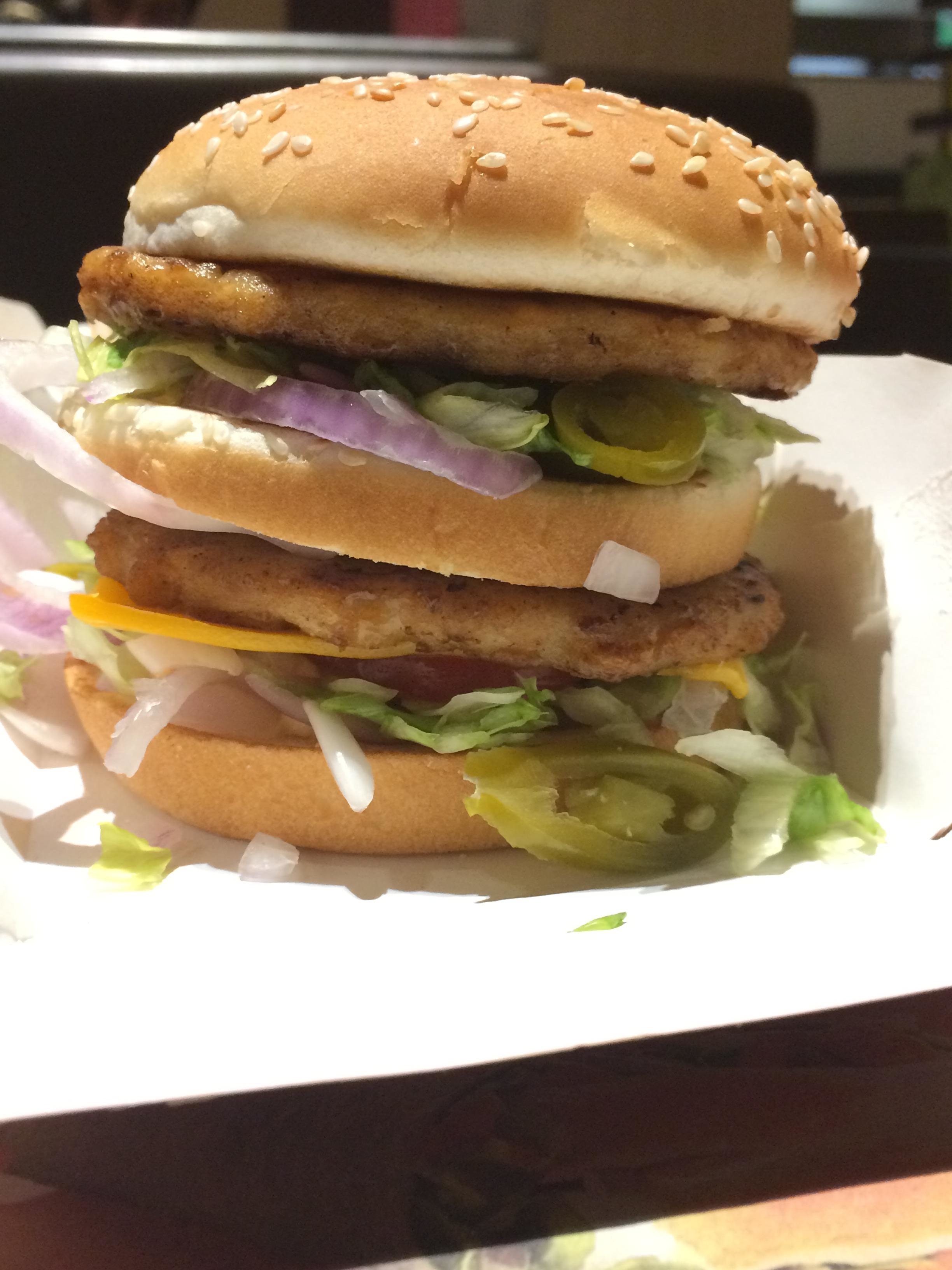 big mac with jalapenos and onions and chicken patties instead of beef