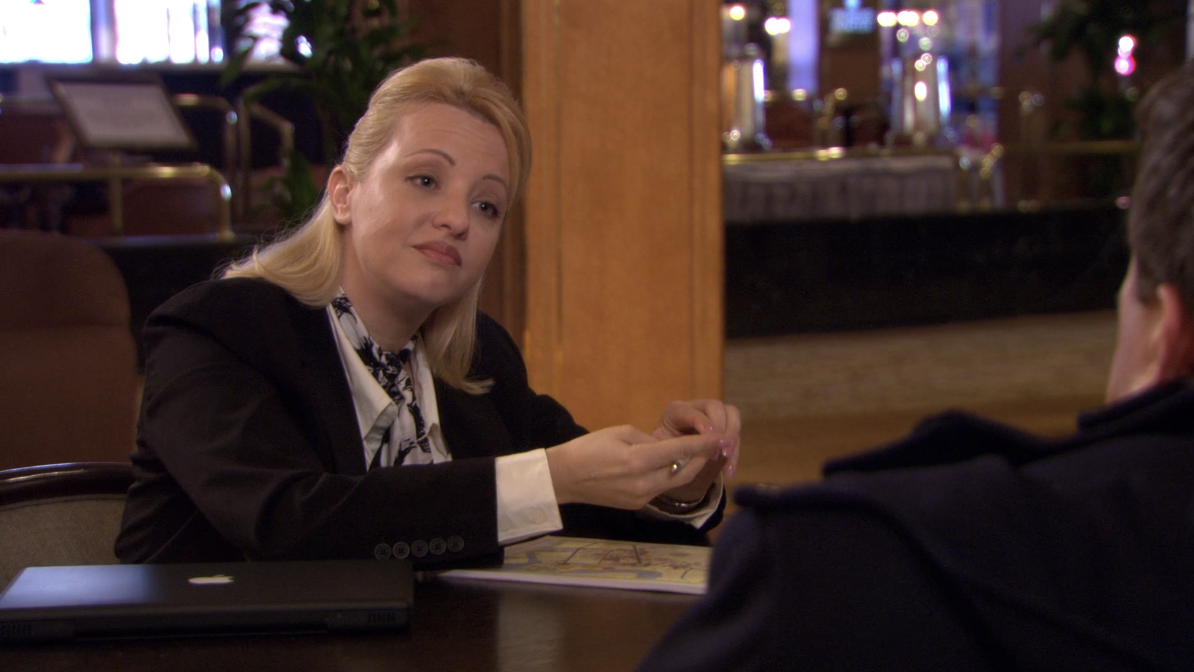 wendi mclendon covey as a concierge on the office