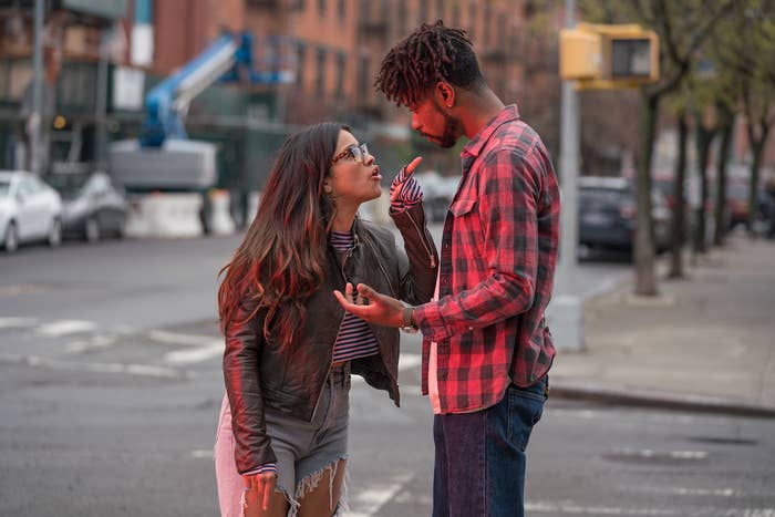 Gina Rodriguez and LaKeith Stanfield arguing in Someone Great