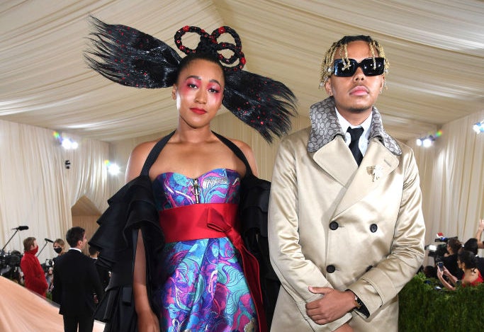 Naomi and Cordae on the steps leading into the MET Gala