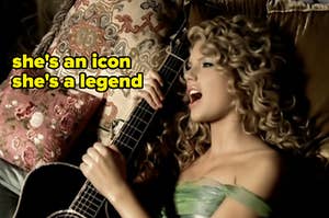 taylor swift laying down with acoustic guitar