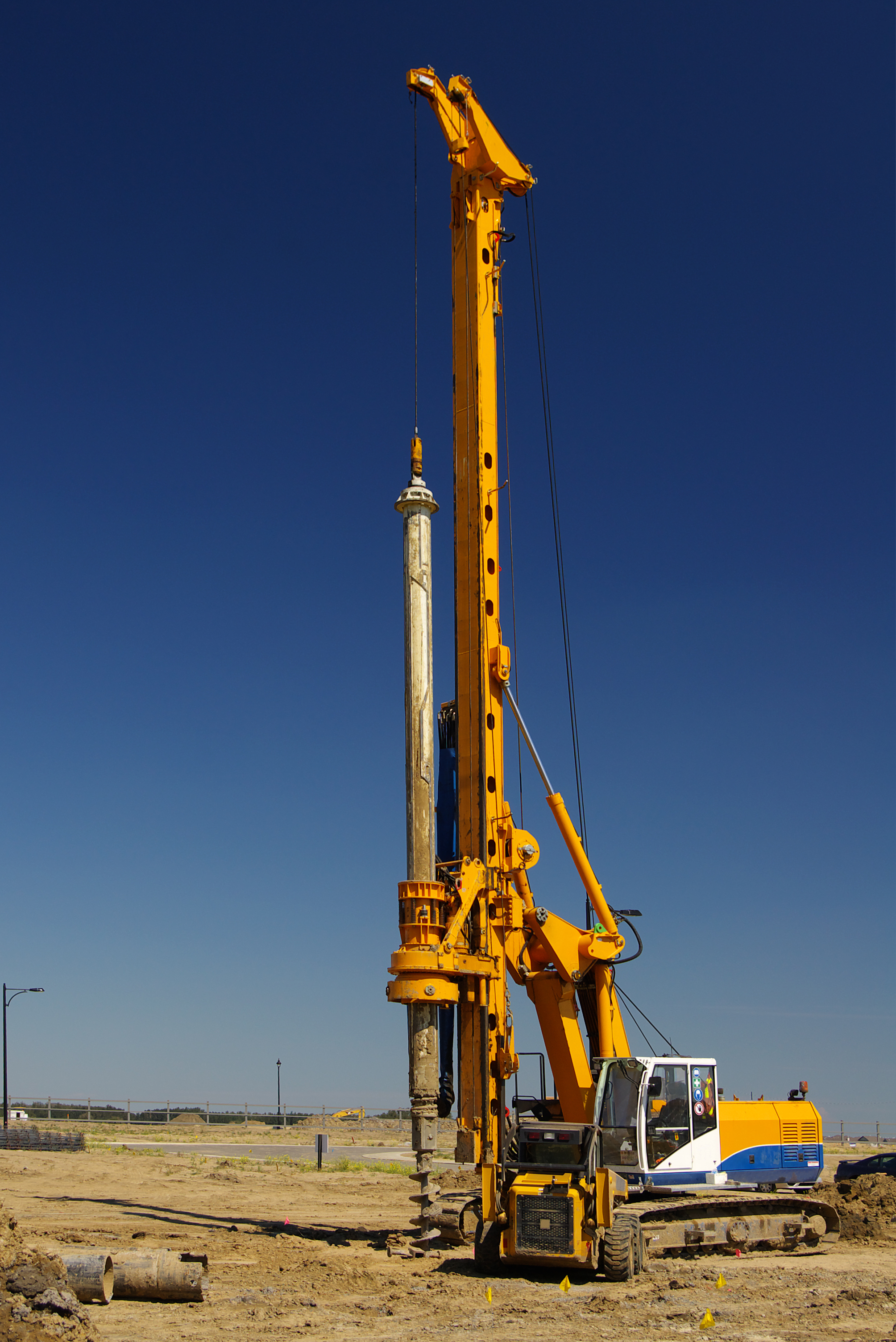 An industrial rotary drill used to create holes for footings and pilings