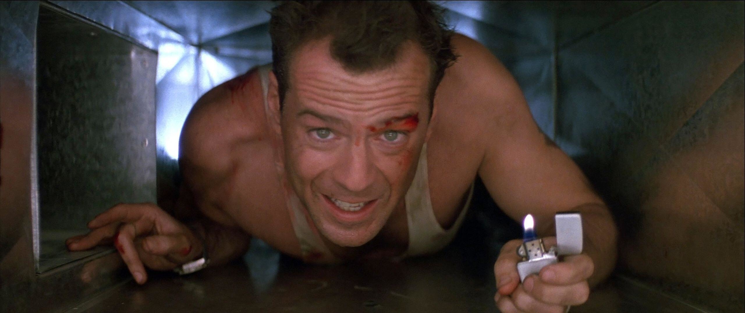 Bruce Willis crawling in Die Hard