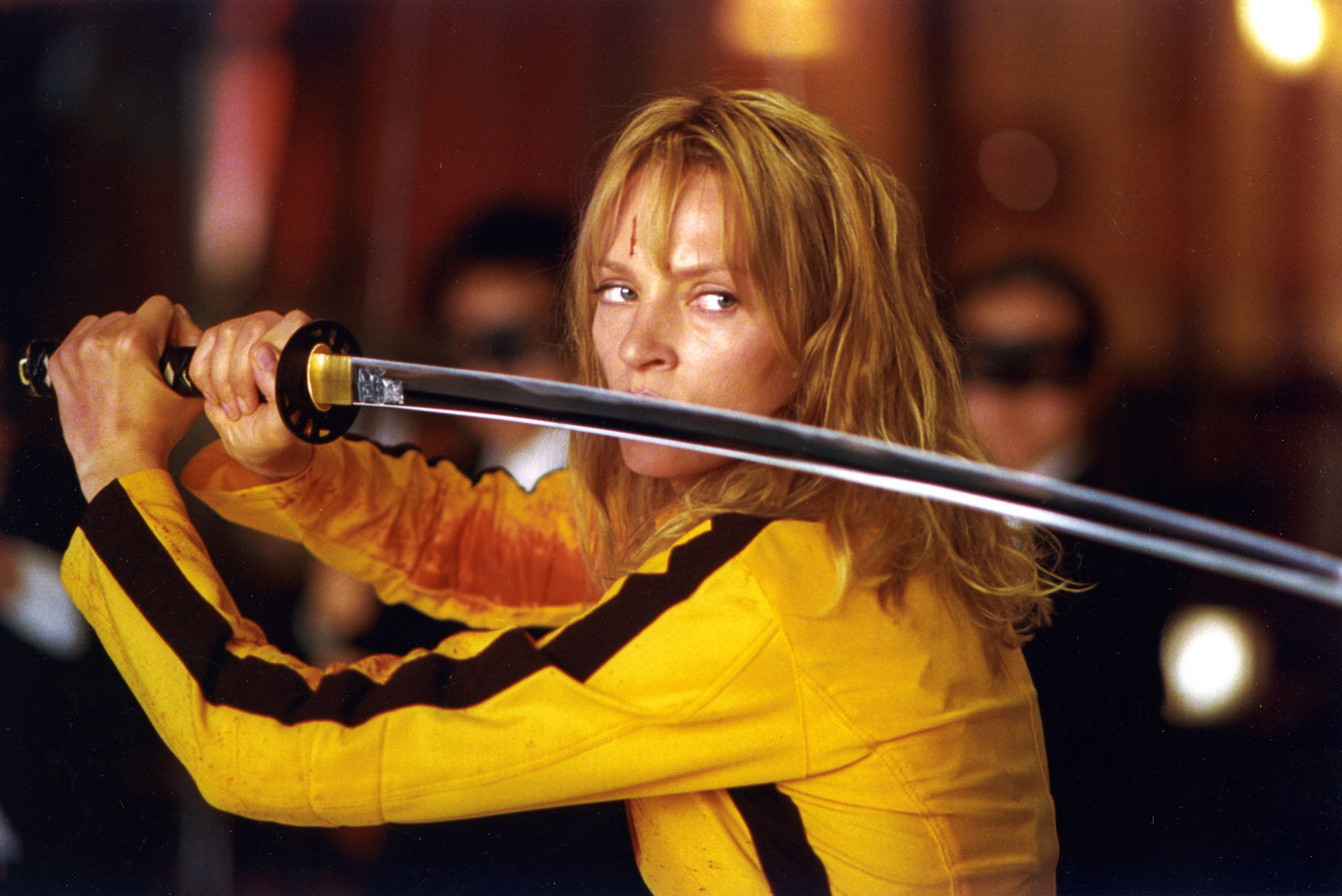 Uma Thurman holding a sword in Kill Bill: Volume 1