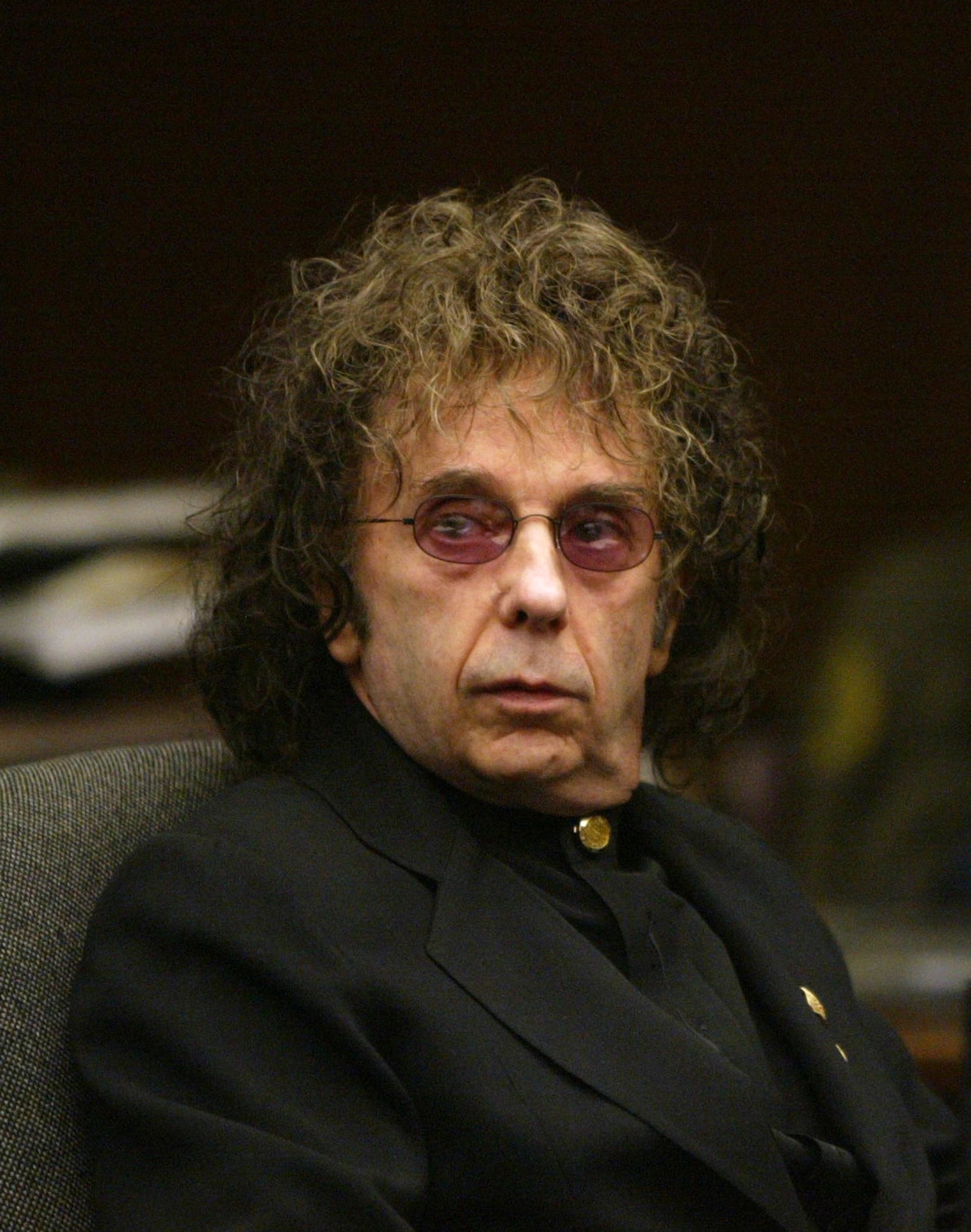 A photo of Phil Spector in court