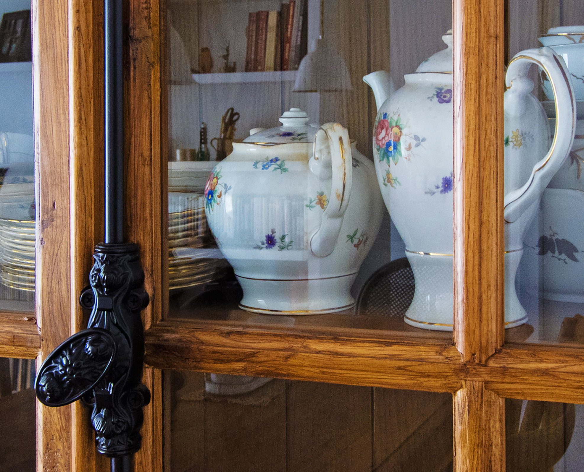 Old china dishes in a cabinet