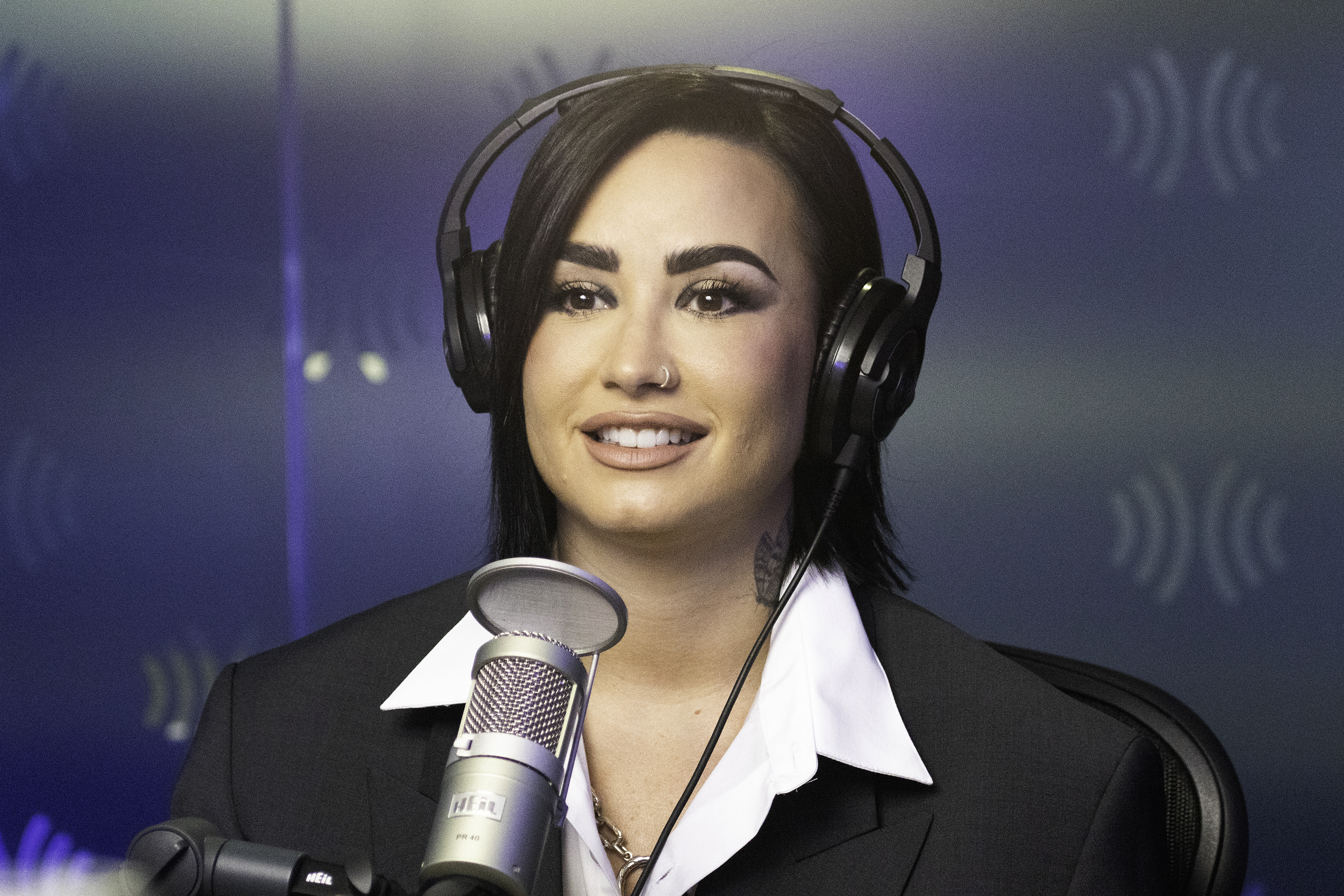 Her giving a radio interview