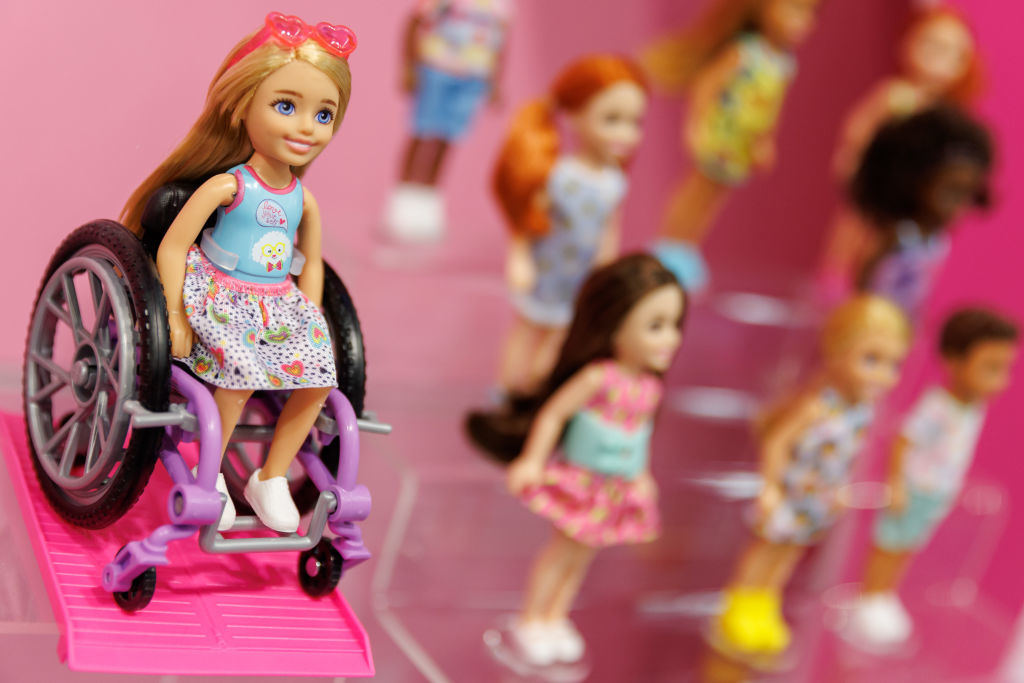 A doll in a wheel chair