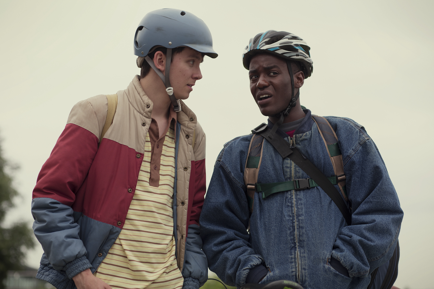 closeup of the teens wearing helmets