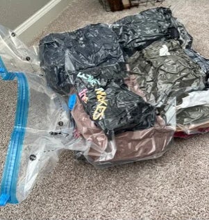 a bag of clothes with the air sealed out
