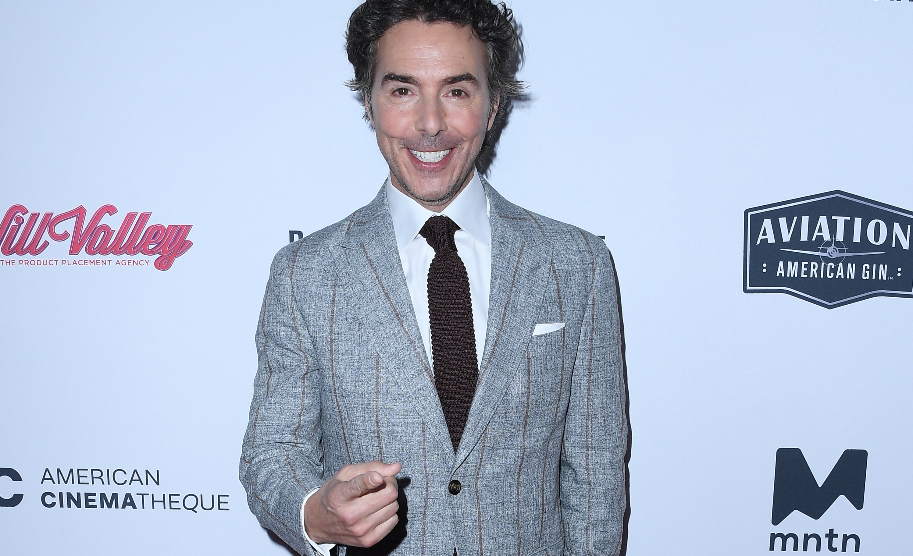 Shawn Levy pointing and smiling at the camera